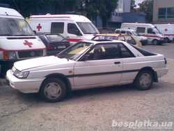 Заднее стекло Ниссан Санни В12 куппе, RZ-1, оригинал Nissan Sunny 2